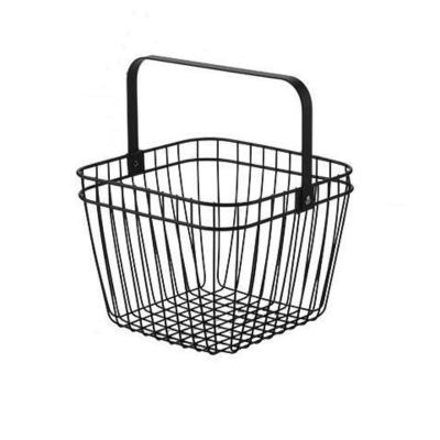 China Desktop Finishing Portable Fruit Basket Stored Iron Hollow Household Storage Basket Snacks Fruit Basket for sale