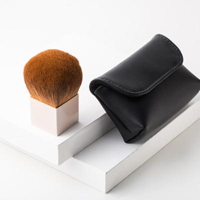 China Fan Brush Vegan Professional Makeup Tool Goatlon Gold Cubic Cosmetics Brush With Travel Pouch For Powder for sale