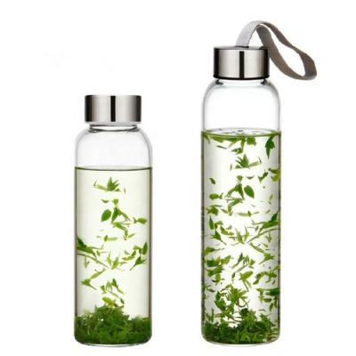 China Sustainable Size Quality Borosilicate Glass Water Bottle Stainless Steel Lid With Sleeve for sale