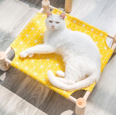 China Hot Sale Removable Washable Pet Sleeping Bed Indoor Wooden Cooling Cat Bed Dog Sofa Bed for sale