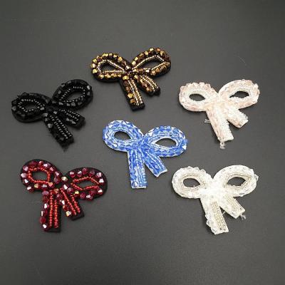 China 2020 factory stock 3D handwork beading knot crystal applique butterfly diy garment accessories for sale