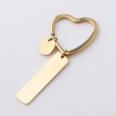 China Environmental Friendly 18K Gold Plated Engraved Custom Logo Mute Key Chain Mirror Polished Stainless Steel for sale