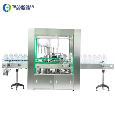 China CLOTHING Wheel Rotary Automatic Hot Melt Glue Opp Round 1L 0.5L Water Bottle Labeling Machine 10000 BPH for sale