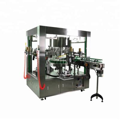 China CLOTHING Paste Sticker Round Bottle Automatic Rotary Neck High Speed ​​Hot Selling Labeling Machine For Wine Or Soy Milk 24000 BPH for sale