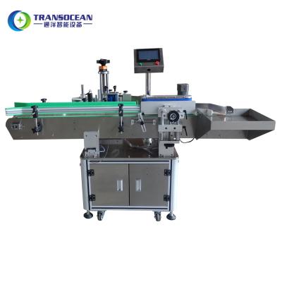 China Vertical Automatic CLOTHING Round Bottle Labeling Machine With Date Printer for sale