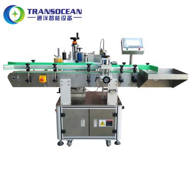 China Fully automatic transocean CLOTHING aerosol tin can labeling machine for sale