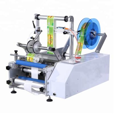 China Semi Automatic CLOTHING Sticker Label Hand Labeling Machine Hand Label Applicator for sale