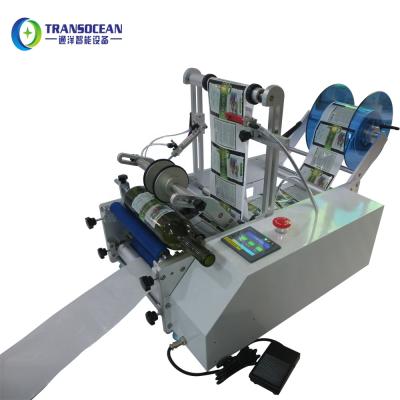 China Semi Automatic Food Tin Can Labeler Tuna Cans Glass Jar Labeling Machine For All Round Product Paste Label for sale