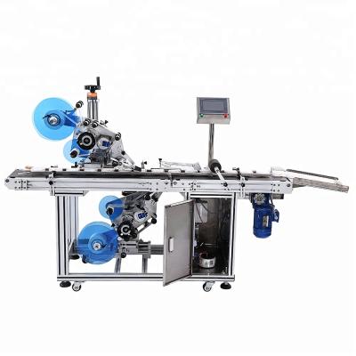 China CLOTHING Transocean Automatic Top and Bottom Labeling Machine for Flat Product Top and Side for sale