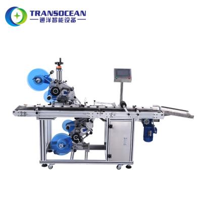 China Fully Automatic CLOTHING Transocean Box Bag Flat Top And Bottom Labeling Machine Manufactures for sale