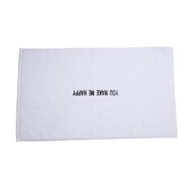 China Viable Wholesale Custom Logo Jacquard Logo White 100% Cotton Bathroom Rug Bath Mat for sale