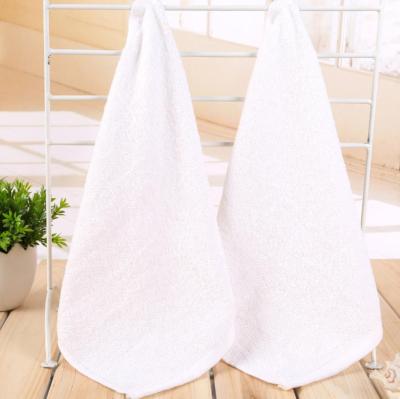 China Exceptional Absorbency Custom Logo Absorbency Cotton Face Towel 70g Luxury White Soft 100% Luxury White for sale