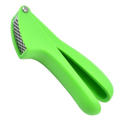 China Sustainable Kitchen Supplies Crush Garlic Manual Stainless Steel Garlic Press Tool for sale