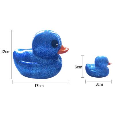 China New 8x7.5x6.5cm Eco-friendly Material Toys For Kids Rubber Bath Floating Healthy Bath Toy Gifts For Newborn BB Toy Glitter Duck With 6 Colors Assort for sale