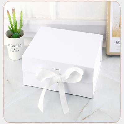 China Recycled Materials Logo White Custom Pink Black Cardboard Magnetic Folding Gift Packaging Boxes With Lid Paper Ribbon Packing Square Tall Clothe Box for sale