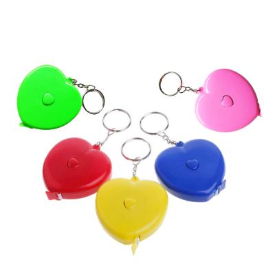 China New Heart Shape Retractable Measuring Tape Plastic Metric Tape Measure For Body Cloth Measuring Tape For Sewing Soft Measuring Tape for sale