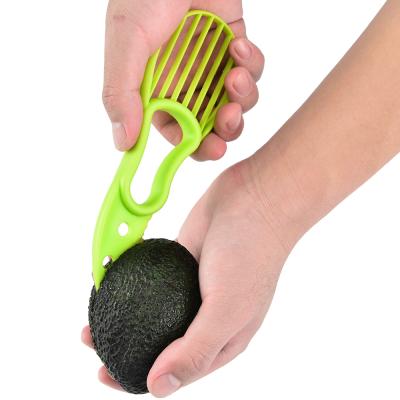 China Viable Cheap Kitchen Tools Gargets Plastic Avocado Hollow Puncher Slicer Fruit and Vegetable Tools Kitchen Accessories Kitchen Tools for sale