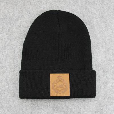 China COMMON custom private leather patch logo women winter snow beanies wool-acrylic hats for sale for sale