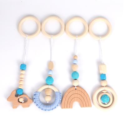 China Eco-Friendly Gain Wholesale Wooden Teether Playing Pendant For Baby Play Gym Hanging Toys 4 Pieces Set for sale