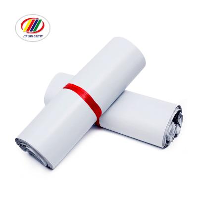 China Disposable Environmental Protective Waterproof Impact Resistance Manufacturer Stock Products Wholesale Customized Color Print Plastic Bag Destructive Sticker Wrap Wrapped LDPE Bag for sale