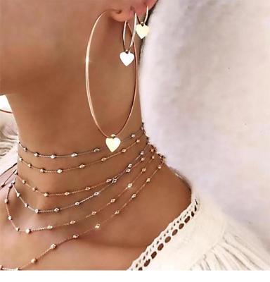 China Ethnic simple circle earrings for women hollow circle round earrings with heart earrings gold color jewelry for sale