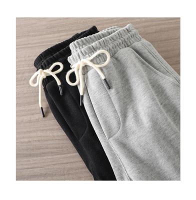 China Anti-Static American Heavy knit sweatpants men's fall new loose drawstring gray sweatpants men's casual girdle pants for sale