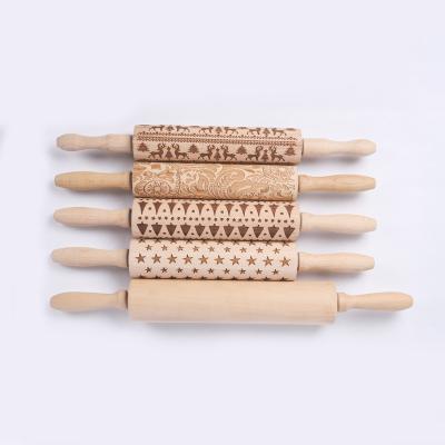 China 3D Christmas Pattern Wooden Baking Tools Engraved Kitchen Long Wooden Rolling Pin for sale