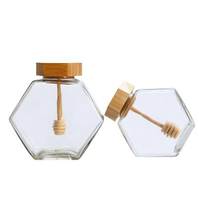 China Empty Wooden Jar Lid 100ml 200ml 500g Hexagon Honey Jar With Dipper for sale