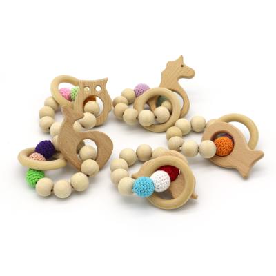 China Brinquedos de dentição de bebés de madeira-Teether Bracelet de enfermagem de silicone de dentição de pérolas de silicone de qualidade alimentar brinquedos molares à venda