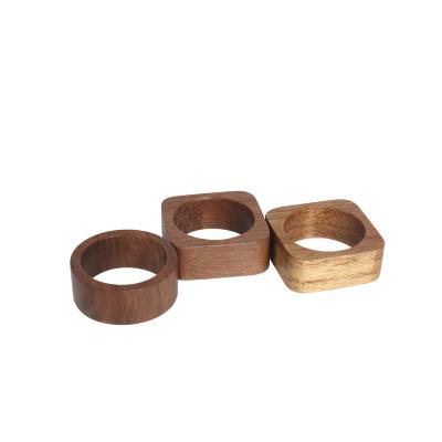 China Anillo de servilletas de madera de nuez para restaurantes Anillos de servilletas de alta calidad en venta