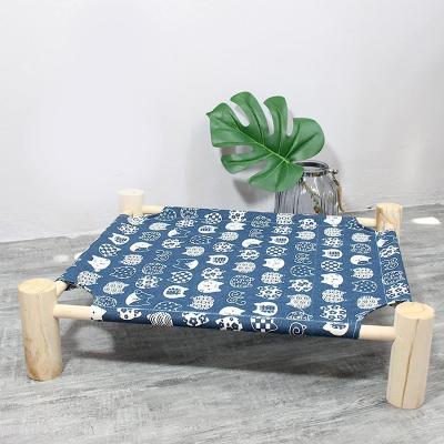 China Cachorro e gato cama de rede cama de madeira cama de resfriamento de gato elevada cama removível portátil interior exterior cama de animais de estimação adequado para gatos à venda