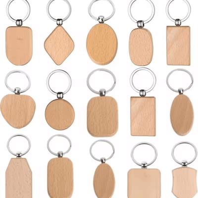 China Ecofriendly Custom Shape Engraving Logo Wooden Keyring Blank Wood Keychain for sale