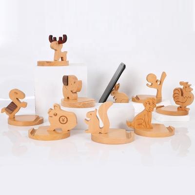 China Custom Assorted Animals Wooden Mobile Phone Holder for Indoor Use to Relieve Fatigue for sale