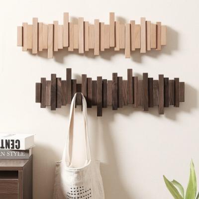 China Walnut Wooden Wall Hanger Creative Piano Key-Type Clothes Rack with Staggered Hook Single Tier for Entrance Storage Living Room for sale