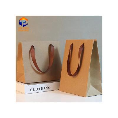 China Recyclable Wholesale High Quality Paper Gift Bags Luxury Corrugated Packaging Bags With Ribbon Handle for sale