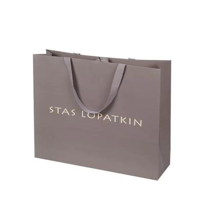 China Recyclable High Quality Luxury Clothing Pink Corrugated Paper Gift Bag Shopping Kraft Paper Bags for sale