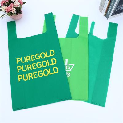 China Reusable Blank Supermarket Nonwoven Wholesale Mall Colorful Shopping Vest Shopping Packaging Nonwoven Carry Bags Fabric for sale