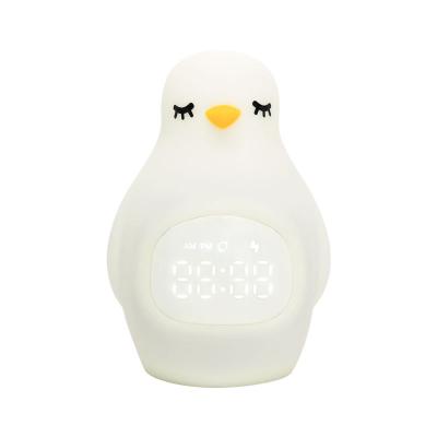 China Multifunctional Adjustable Lamp Modern Smart Bedside Alarm Clock Penguin Night Light Small For Children for sale