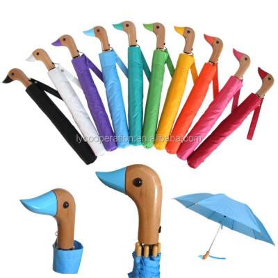 China Nylon duck with wooden umbrella handle for sale