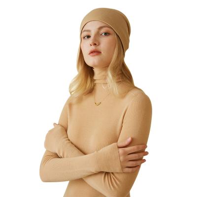 China Bearing 2023 Wholesale High Quality Daily Warm Winter Heat Preservation Hat For Man And Woman White Logo Knit Cuff Beanie Custom Made for sale