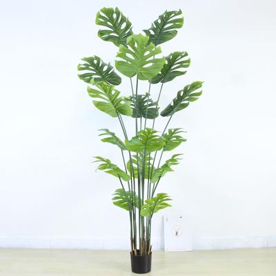 China Minimalist 100Cm Large Plastic Fake Fake Monstera Adansonii Variegata Artificial Leaves Grow Leaves Potted Plant Monstera Tree for sale