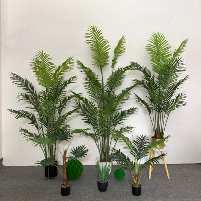 China Minimalist High Quality Plastic Artificial Fake Mini Palm Realistic Real Touch Tropical Fake Palm Plant Tree For Indoor Decoration for sale