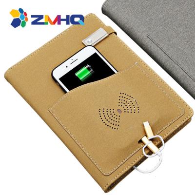 China Deboss office use meeting gift convenient design 8000mAh powerbank notebook with wireless charger usb for sale