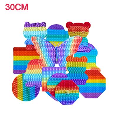 China Toy Stress Reliever Rainbow Pop Big Push Up Toys 30CM Big Push Up Compression Silicone Decompression Push Up Jumping Sensory Toy for sale