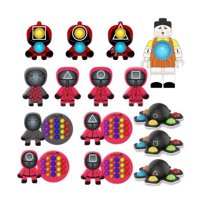 China New Design Push Plastic Pop Bubble Squid Game Chained Single Head Dimple Fidget Finger Spinner Fidget Toy for sale