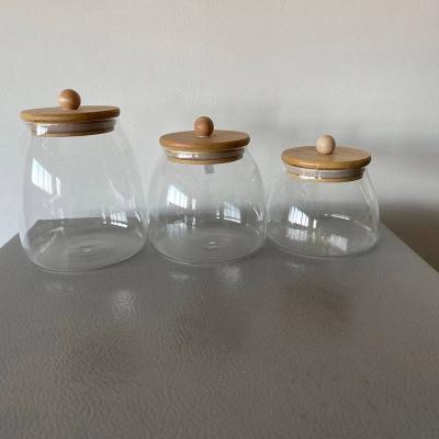 China Modern large capacity high borosilicate glass 3pcs canister set with big beautiful belly, easy open wooden lid, storage jar /household item for sale