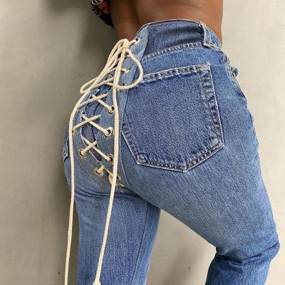 China New Women's Fashion Autumn Slim Breathable Contrast Color Back Strappy Jeans for sale