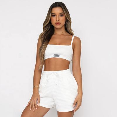 China Waterproof Fashion Trend Cropped Camisole Shorts Solid Color Sports Two Piece Suits Ladies for sale