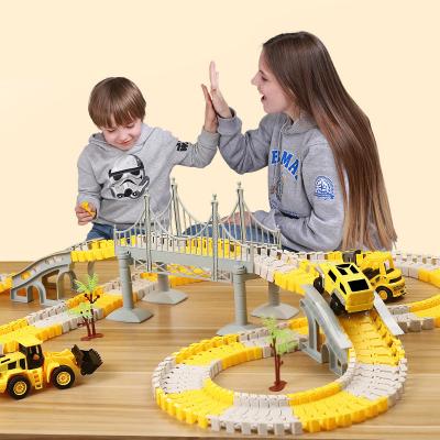 China Slot Toy TongLi 6603 Building Toy Assemble Track Car Slot Car Toy Child Rail Toys 222 Pcs Electric Railway Miniature Race Car for sale