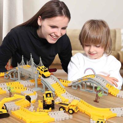 China Various Tracks Education Children Engineering Car Toy Railway Car Slot Toy DIY Assemble Puzzle Toy For Children for sale